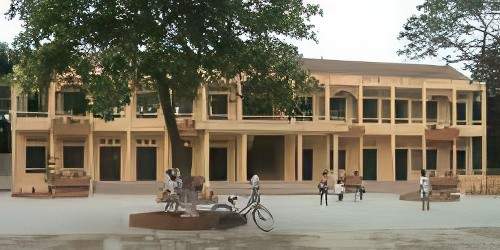 A two-story yellow building with multiple doorways and arched windows at each level. Several people are visible in front, including individuals with bicycles and children playing.