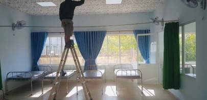A workman in one of the clinic's rooms 