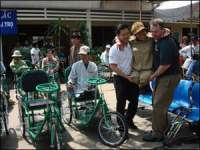 Handicapped men outside of the rehabilitation center