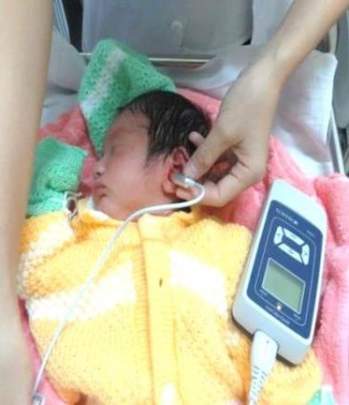 screening a newborns for hearing loss